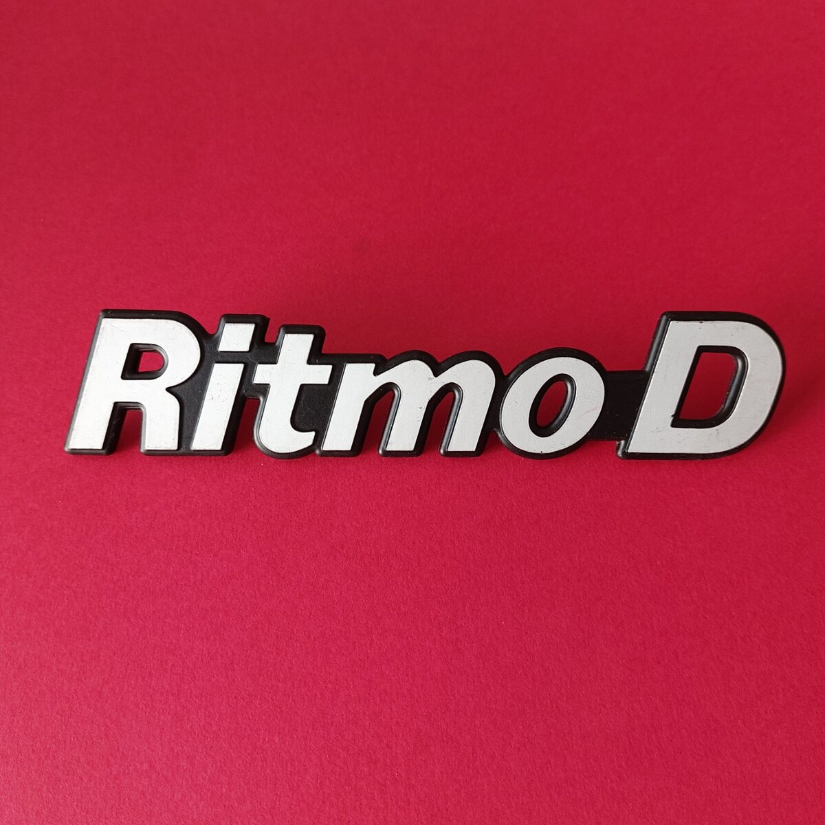 Fregio Ritmo D in metallo nero e argento per Fiat Ritmo