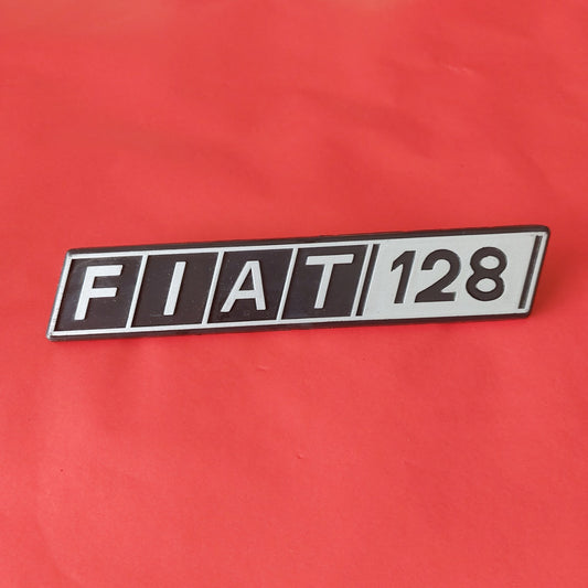Stemma FIAT 128 NOS, vista frontale