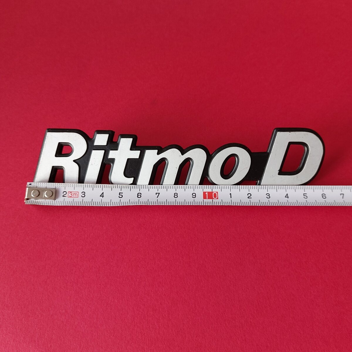 Misure fregio Ritmo D in metallo lungo circa 16 cm