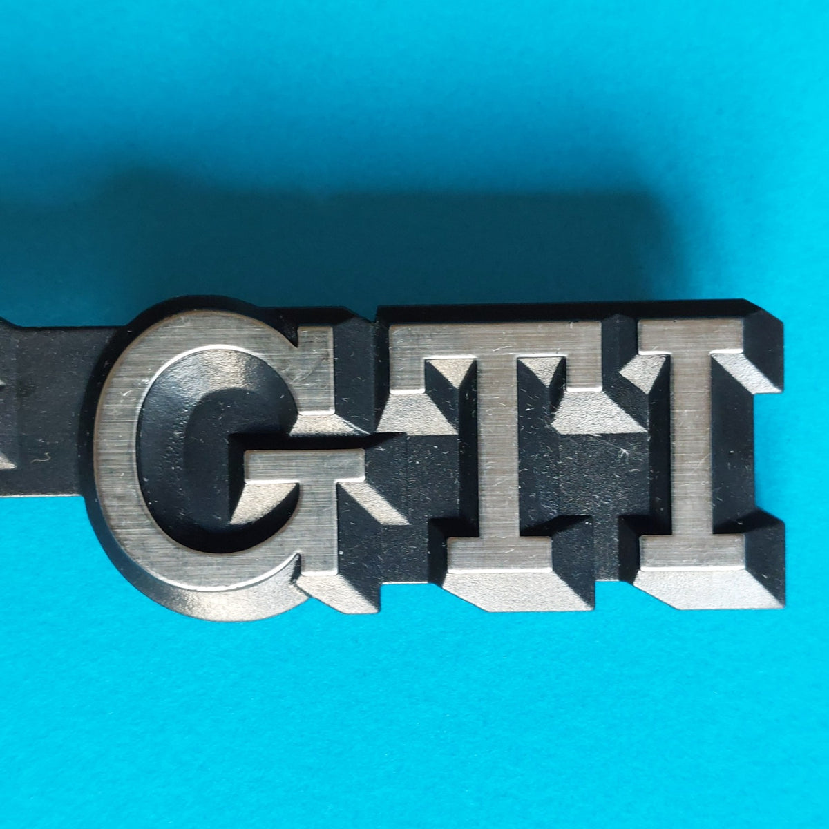 Dettaglio GTI stemma originale Volkswagen Golf II