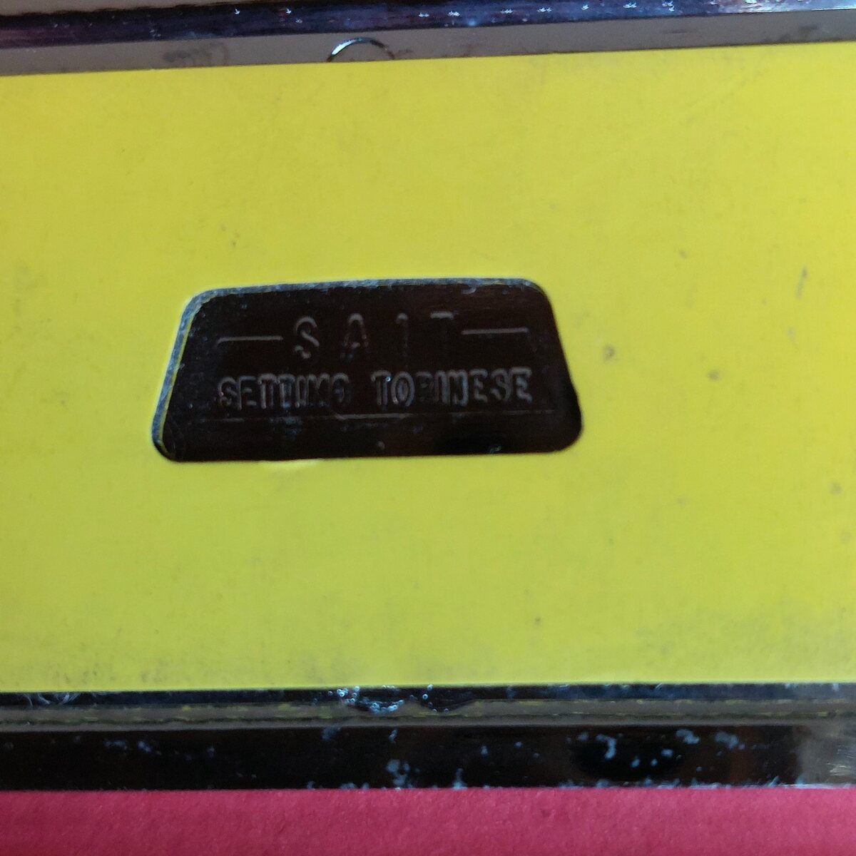 Marchio SAIT Settimo Torinese sulla scritta Lancia Prisma