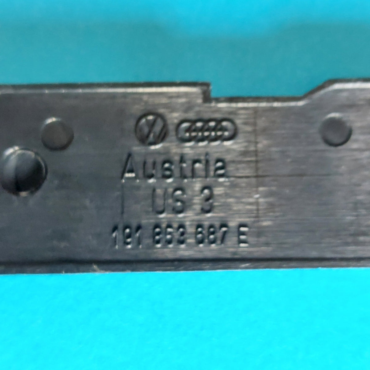 Codice OEM 191 853 687 E e marchi VW Audi Austria sul retro
