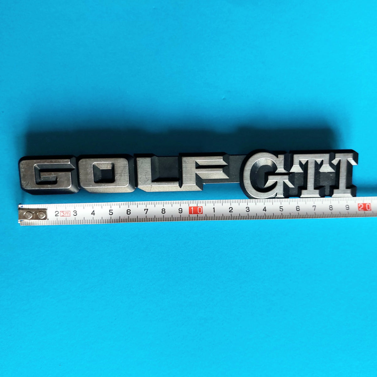 Stemma VW Golf GTI 191 853 687 C con misura 