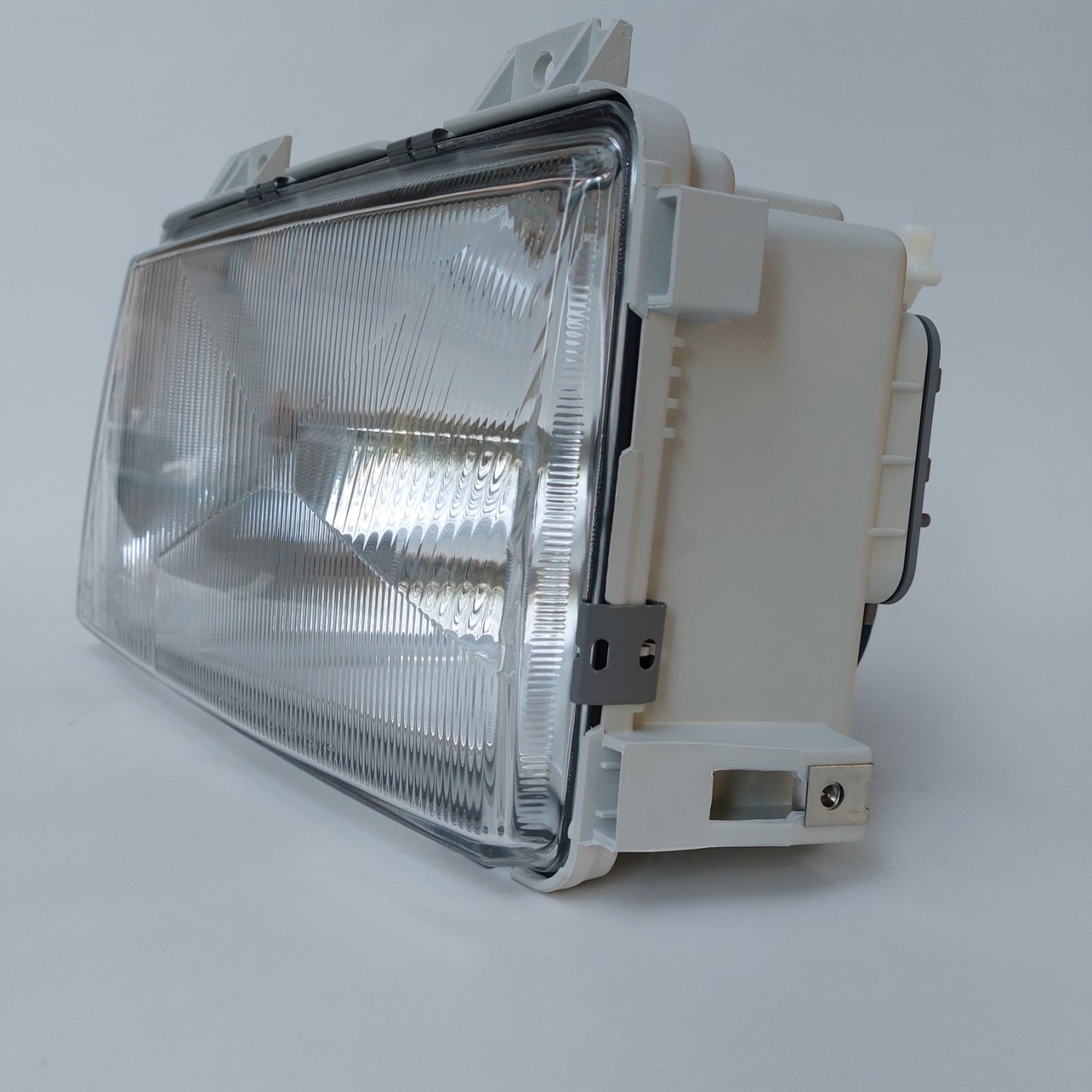 1EH 006 900-051 — Faro sinistro Hella per Mercedes-Benz Sprinter — NOS