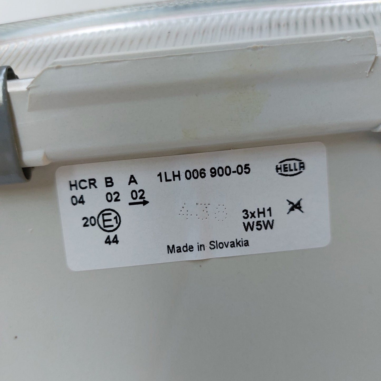 1EH 006 900-051 — Faro sinistro Hella per Mercedes-Benz Sprinter — NOS