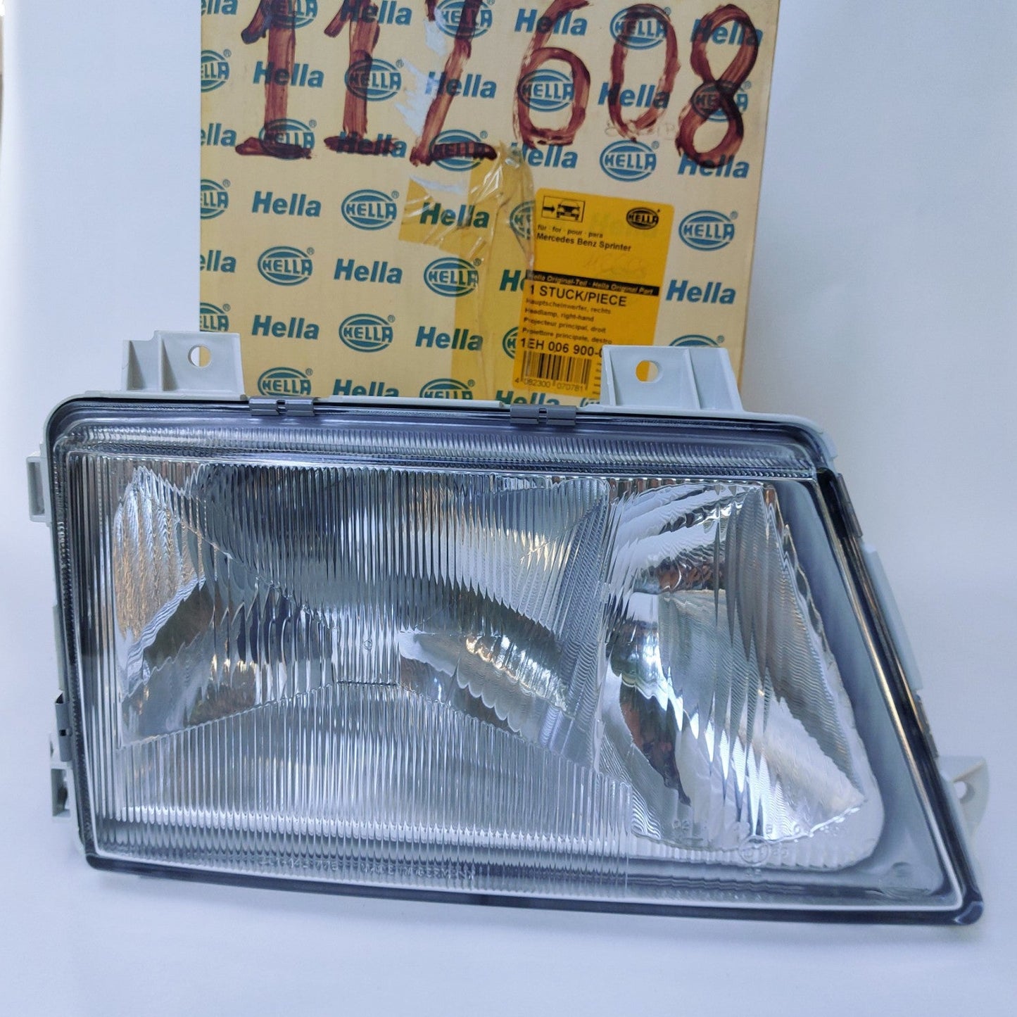 1EH 006 900-06 — Faro destro Hella per Mercedes-Benz Sprinter — NOS