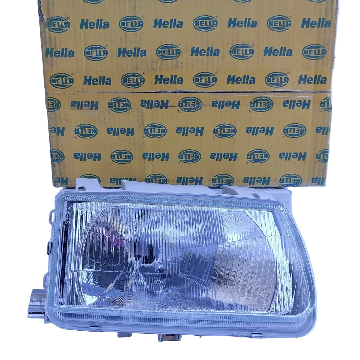 1AF962489141 Faro anteriore destro Hella Volkswagen Polo III NOS