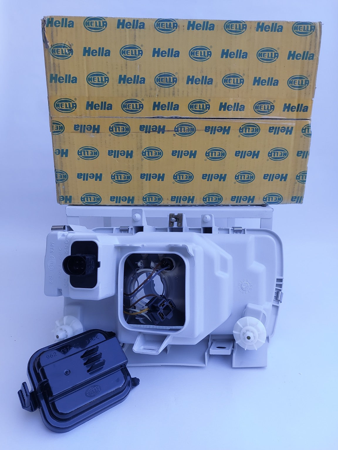 1AF962489141 Faro anteriore destro Hella Volkswagen Polo III NOS