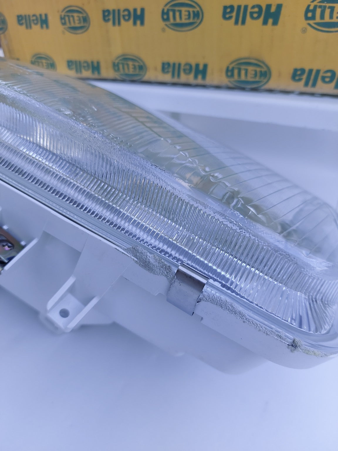 1AF962489141 Faro anteriore destro Hella Volkswagen Polo III NOS