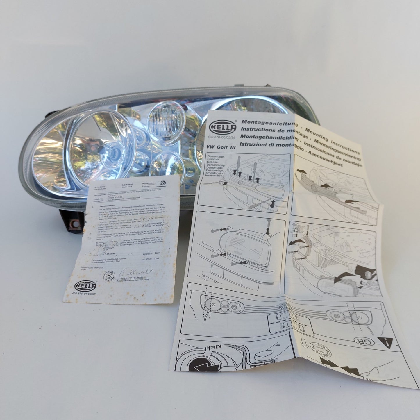 1DJ 008 187-011 Faro anteriore sinistro Hella Klarglas Volkswagen Golf III NOS