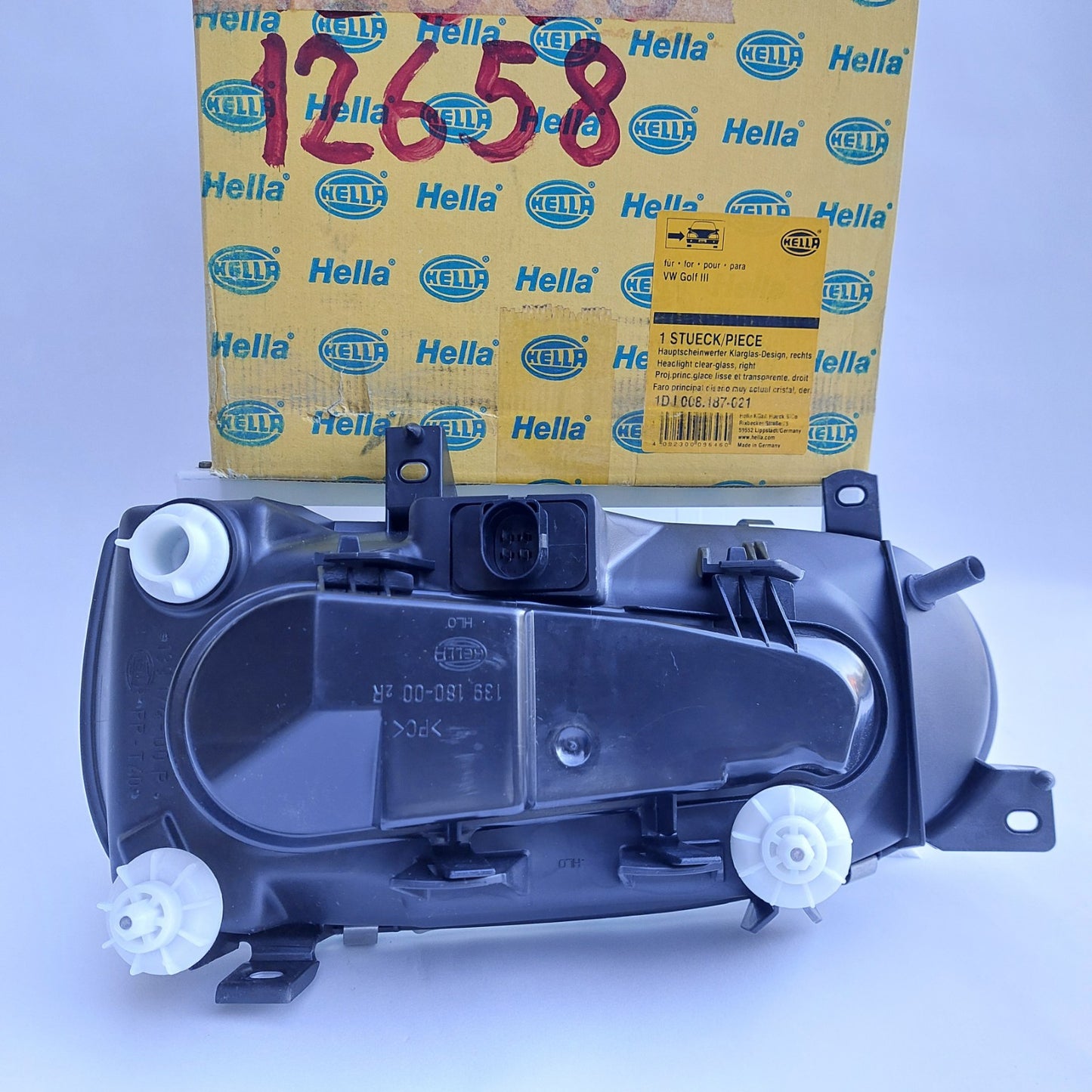 1DJ008187-021 Faro anteriore destro Hella Klarglas VW Golf III NOS